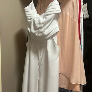 Bebe size 0 white jumpsuit NWT